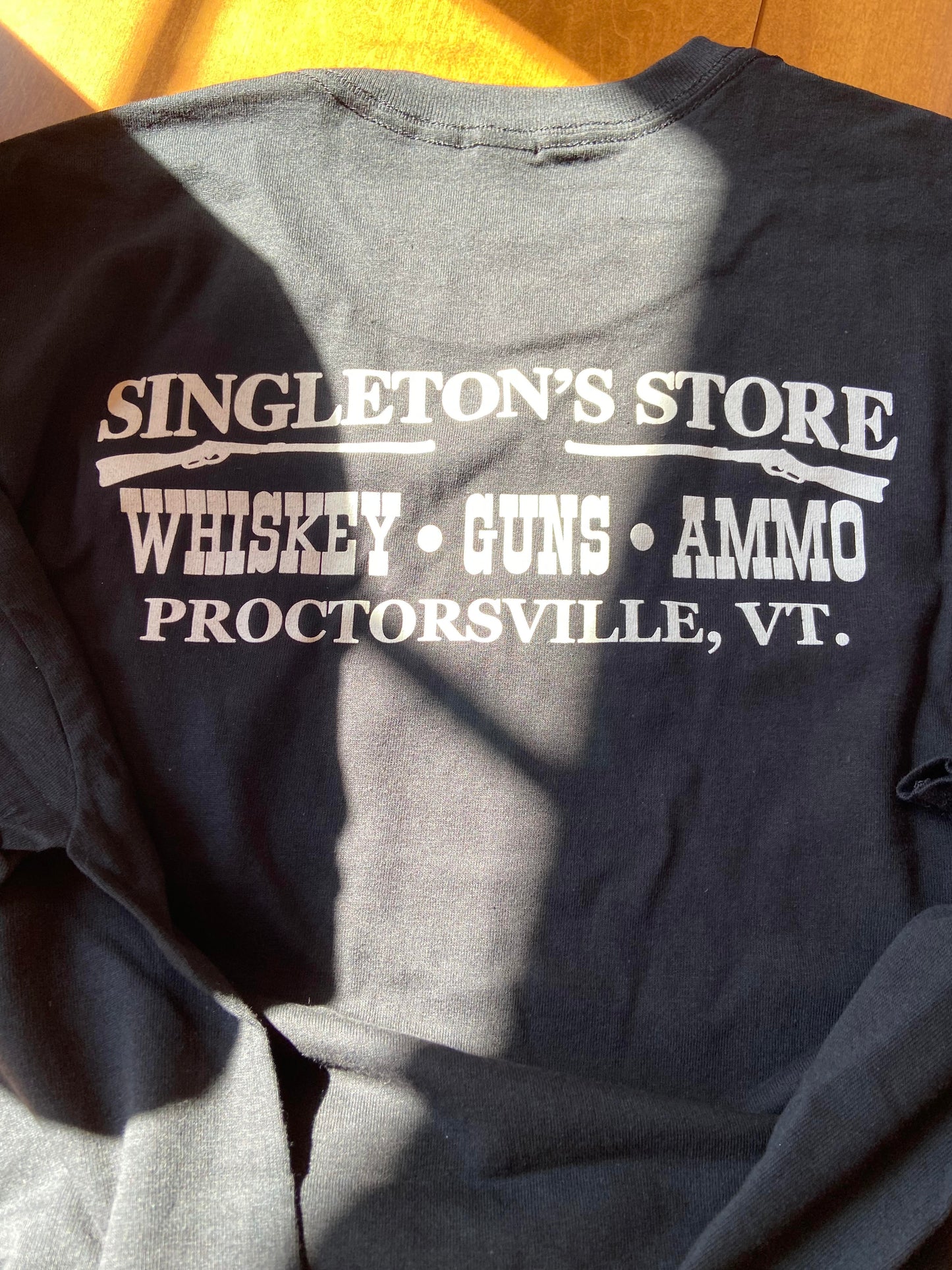 Item #54: Singleton's General Store - TShirt & Two Gift Certificates ($50/ea)
